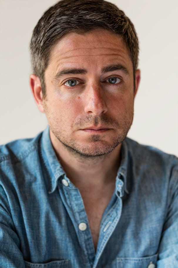 A portrait of the photographer Gil Blank